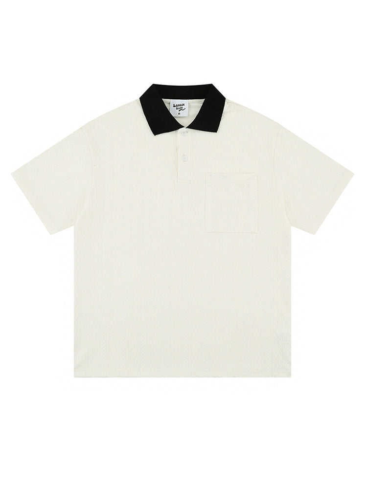 Minimalist White Polo Shirt with Black Contrast Collar and Pocket Detail